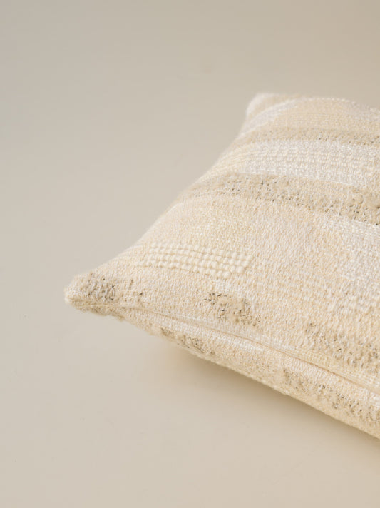 Close-up of the corner of the Hikaru – Sable cushion, highlighting the woven fabric and refined finish