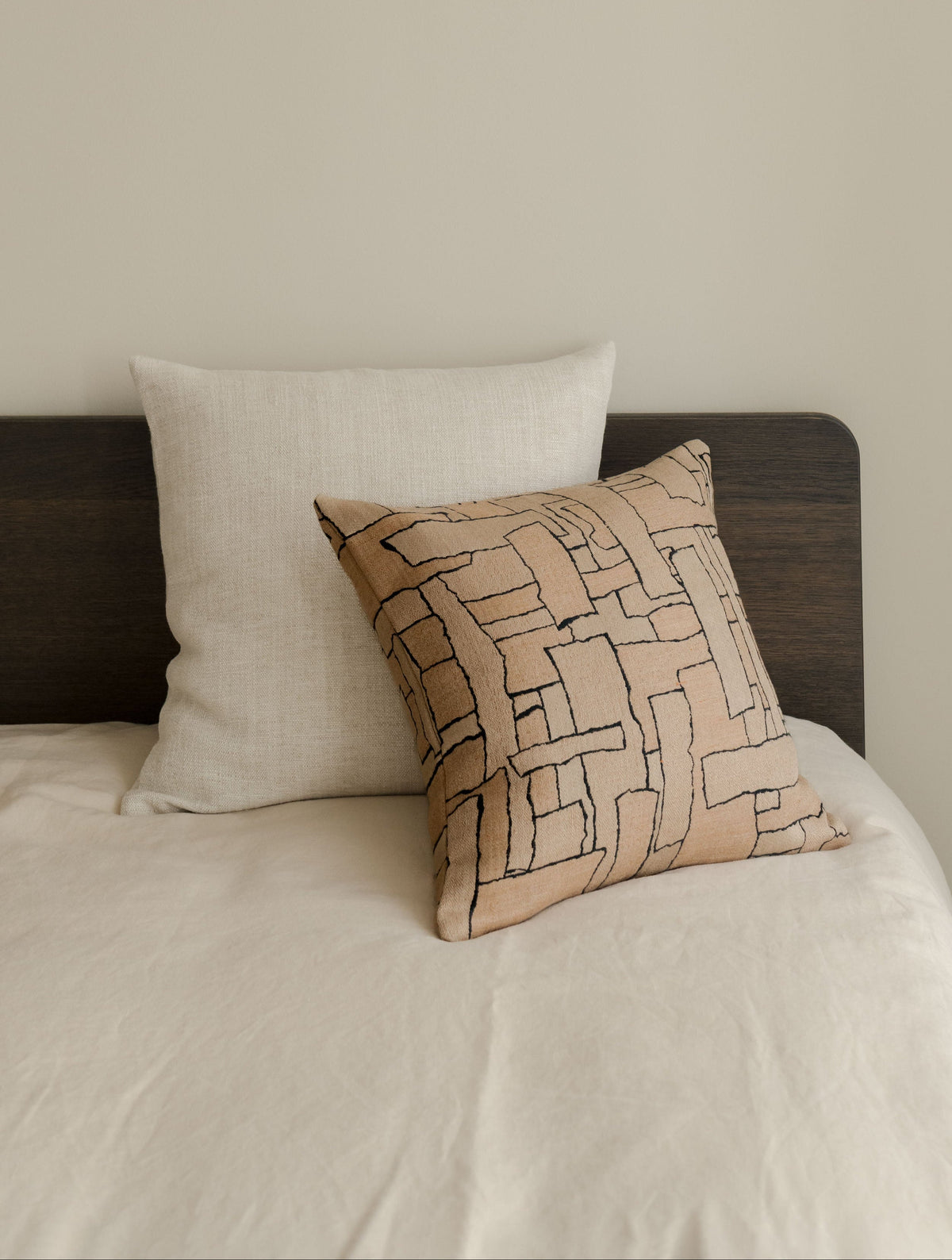 Faded Forms – Large Pair, featuring two textured cushions in soft neutral tones, styled on a white armchair