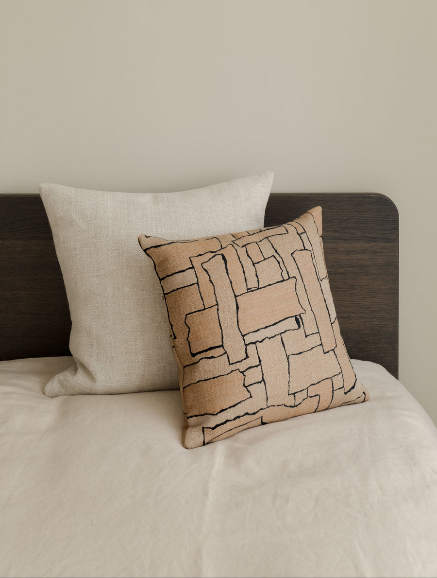 Faded Forms – Small Pair, featuring two textured cushions in soft neutral tones, styled on a wooden chair