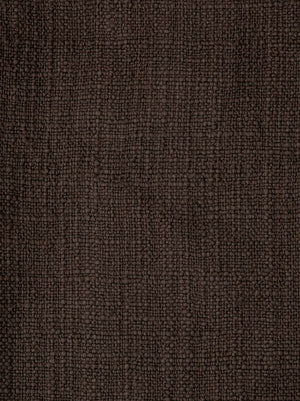 Close-up of the Atelier Moderne – Fondente fabric, showing its irregular slub texture and richly woven linen surface