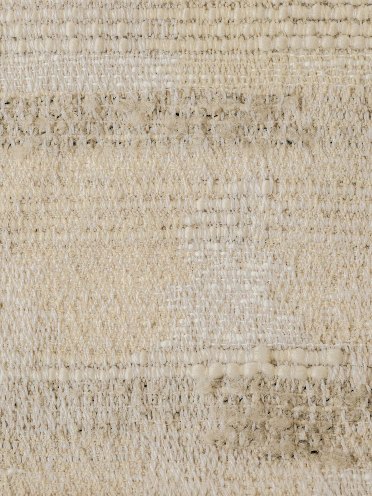 Close-up of the Hikaru – Sable fabric, showing its abstract woven landscape and textured wool-rich surface