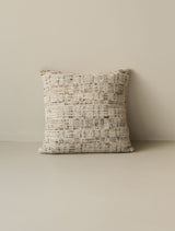 Nicomaco – Raw decorative cushion in 40 × 40 cm, photographed on a white background