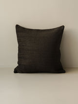 Pampelune – Brun decorative cushion in 50 × 50 cm, photographed on a white background
